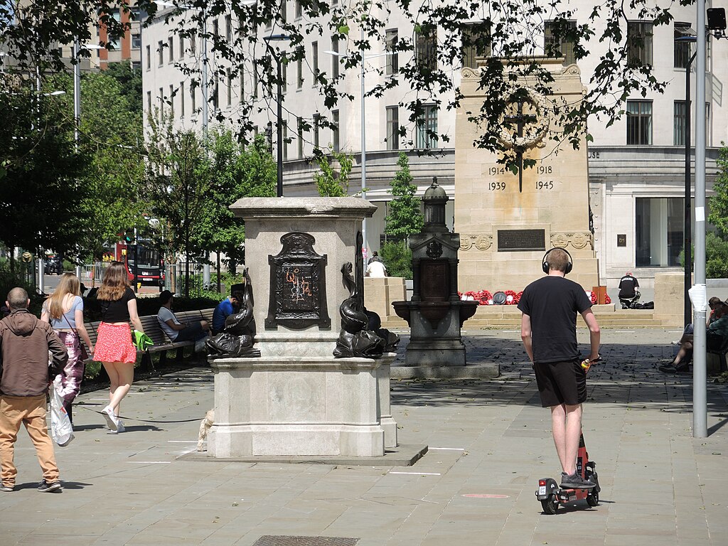 [Photo 4] An empty plinth of the statue of Edward Colston in Bristol, UK. (Credit: Neil Owen, 2021, Geograph Britain and Ireland, Wikimedia Commons).*